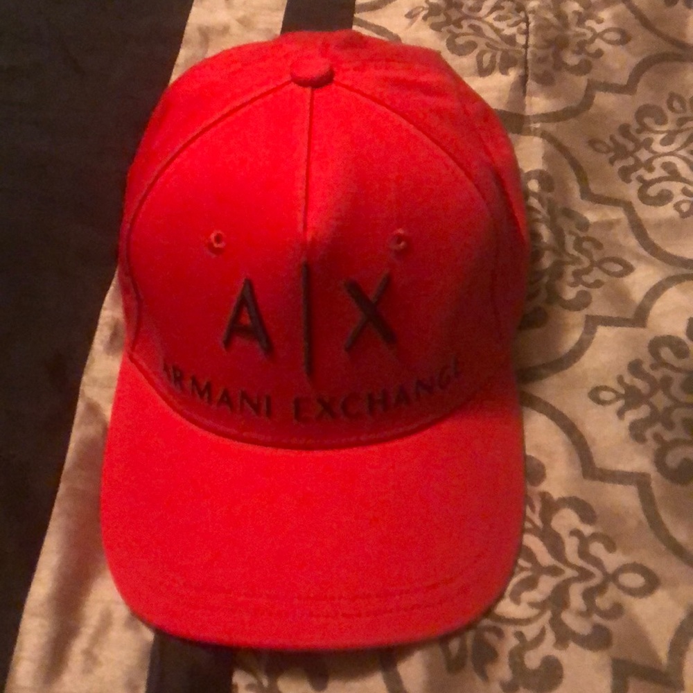 Red Armani exchange hat. Fits all sizes.